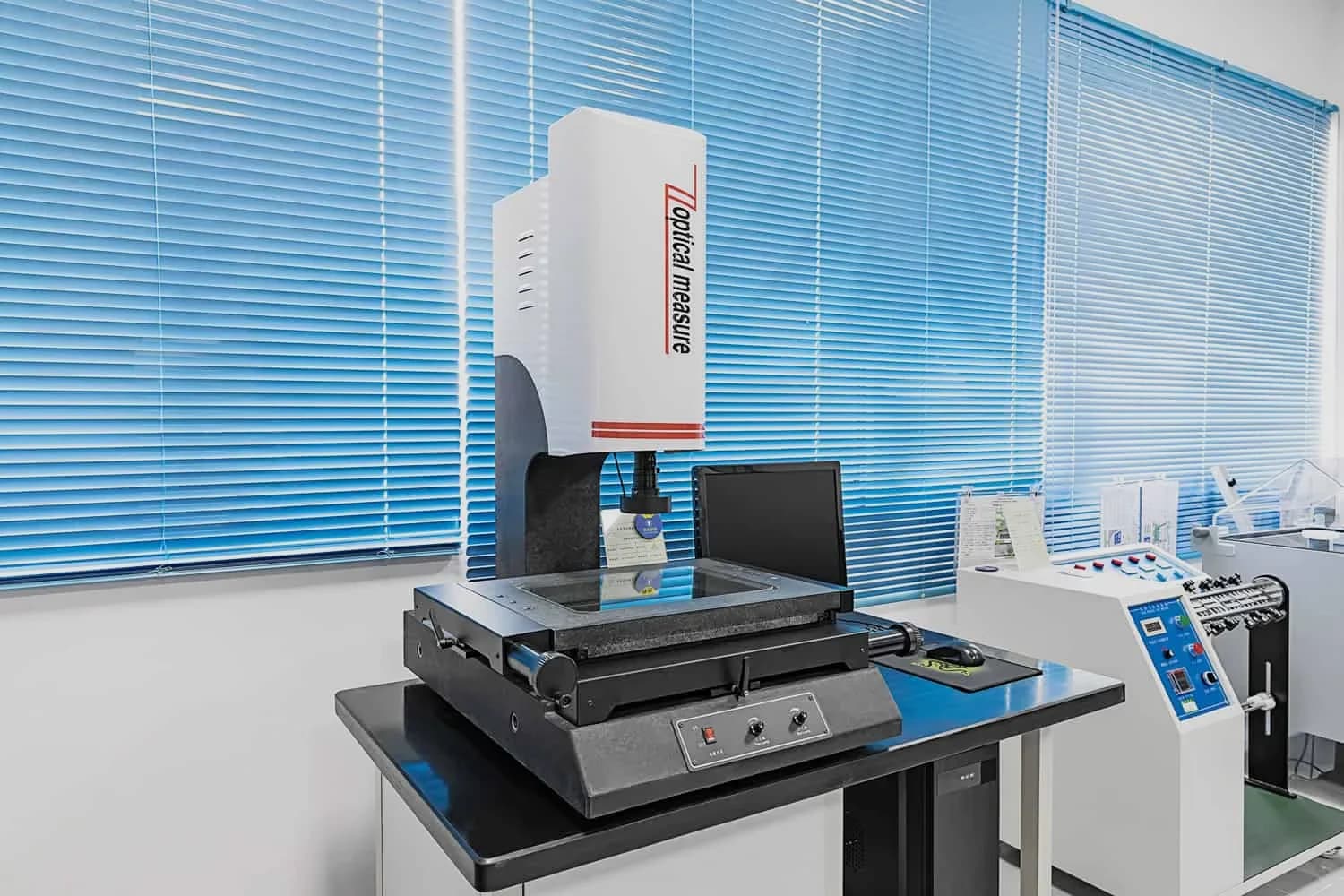 Optical measuring instrument on a quality assurance lab bench