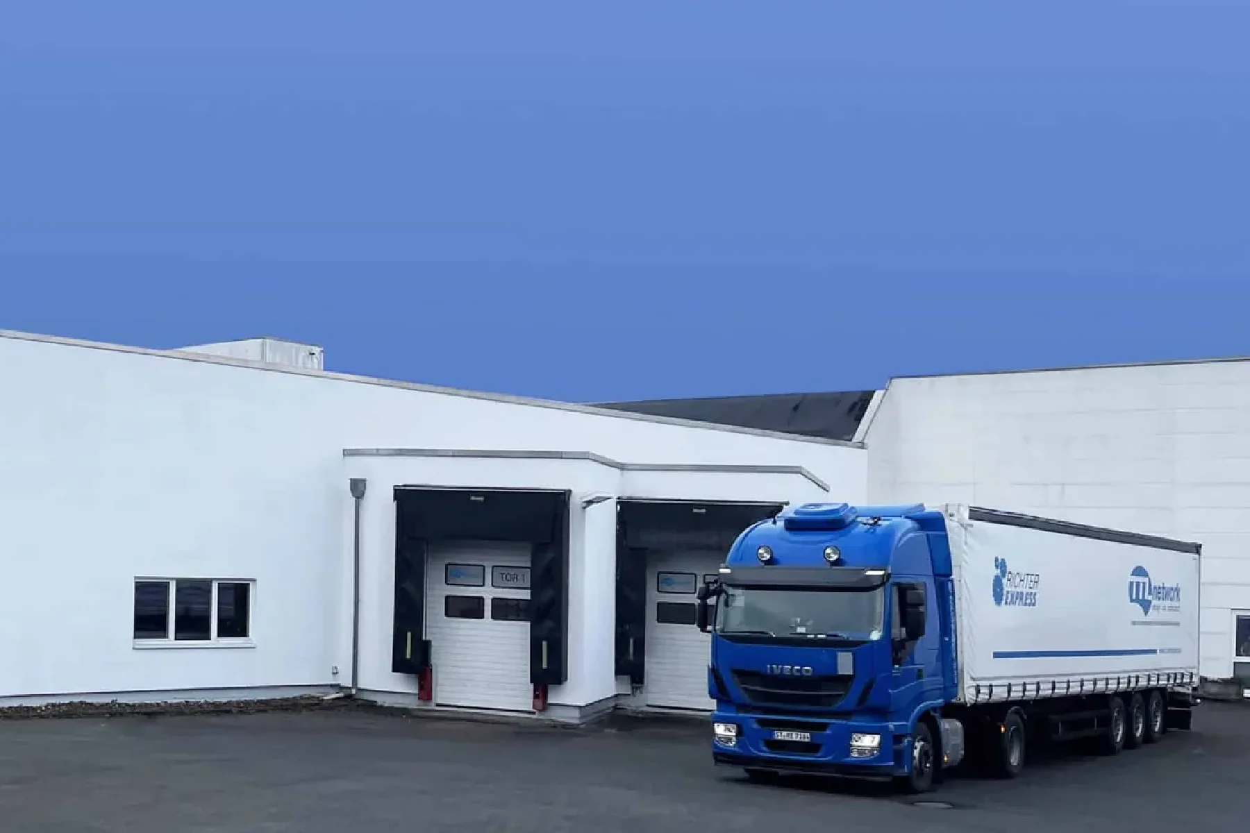 TTL Network company building with an articulated lorry at the loading bay